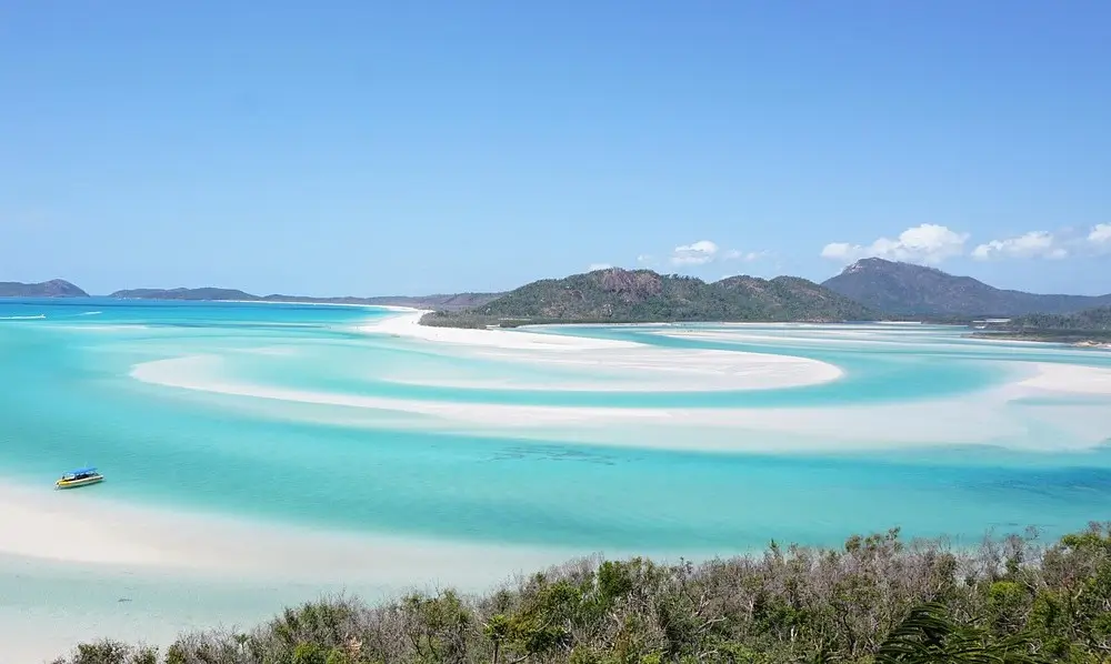 Aerial view of Whitehaven Beach showing pure white sand and turquoise waters