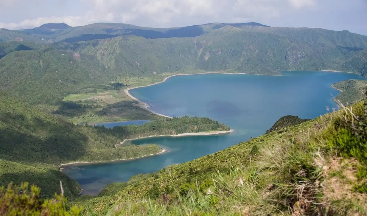 Green volcanic crater lake in Azores Islands
