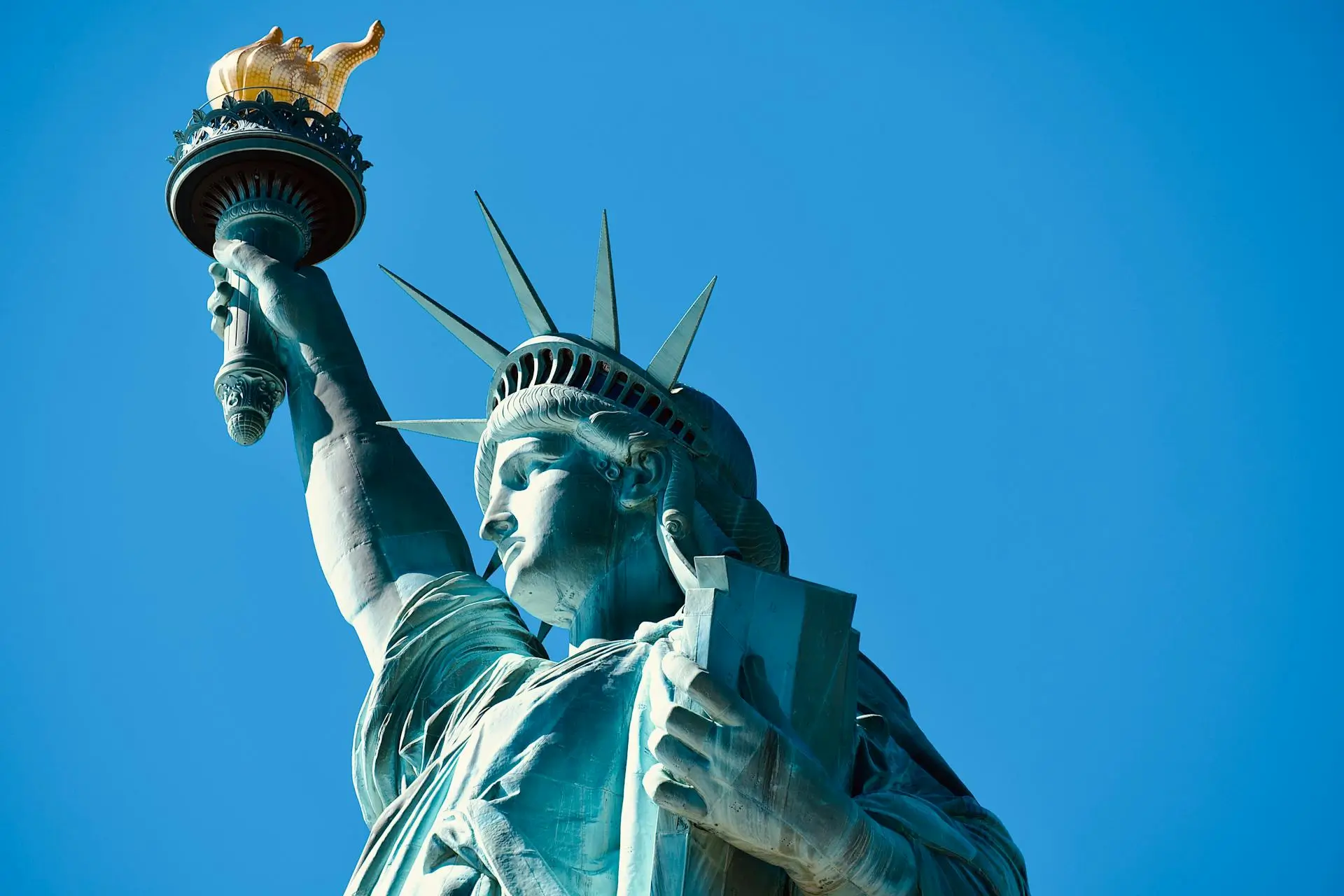 Statue of Liberty with New York City skyline in the background